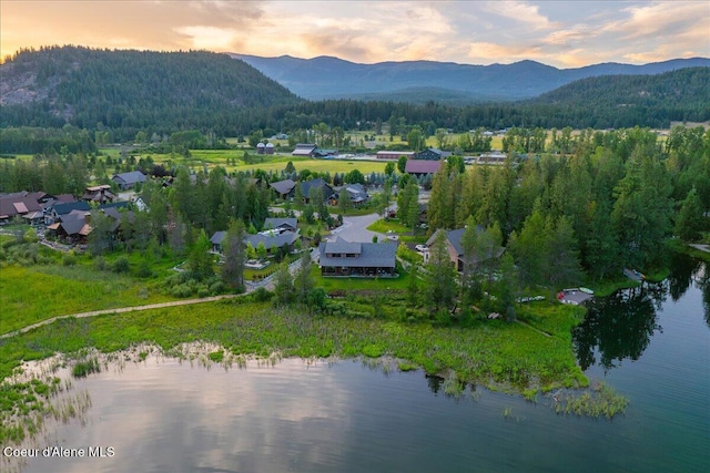 428 W Beach Ct, Dover, ID 83825 - aerial view at dusk of a water and mountain view and a view of trees