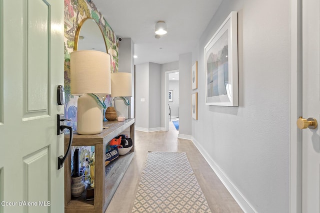 4732 S Arrow Point Dr # 304, Harrison, ID 83833 - hallway featuring light wood finished floors and baseboards