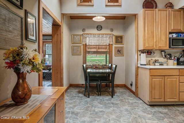 854 Two Tail Rd, Bonners Ferry, ID 83805 - dining space with light stone finish flooring and baseboards