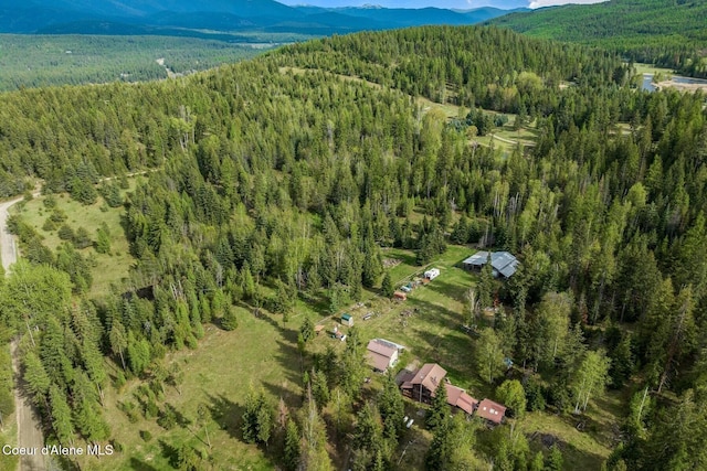 854 Two Tail Rd, Bonners Ferry, ID 83805 - drone / aerial view of a forest and a mountain backdrop