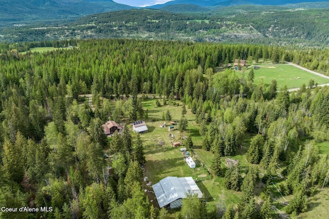 854 Two Tail Rd, Bonners Ferry, ID 83805 - bird's eye view of a heavily wooded area and a mountainous background