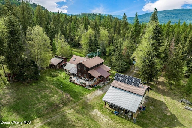 854 Two Tail Rd, Bonners Ferry, ID 83805 - view from above of property with a heavily wooded area and a mountainous background