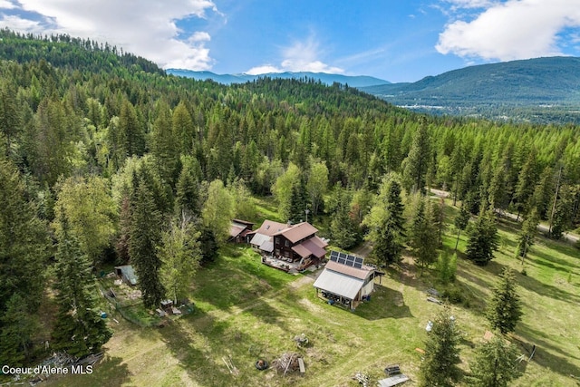 854 Two Tail Rd, Bonners Ferry, ID 83805 - view from above of property featuring a heavily wooded area and a mountain backdrop