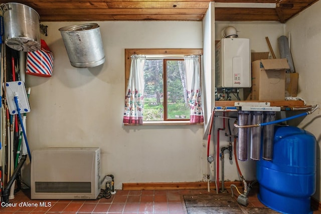 854 Two Tail Rd, Bonners Ferry, ID 83805 - utility room with water heater and heating unit
