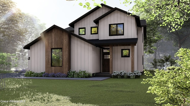 2442 W Okanogan Ave, Post Falls, ID 83854 - modern farmhouse style home with board and batten siding and a front lawn