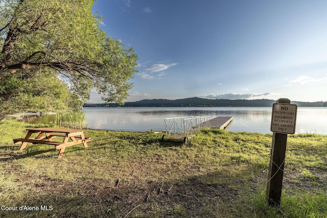 16749 W Cade Rd, Hauser, ID 83854 - water view featuring a boat dock and mountains