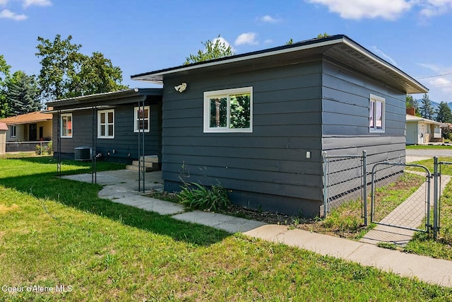 170 10th St, Priest River, ID 83856 - view of home's exterior featuring a gate and a cooling unit
