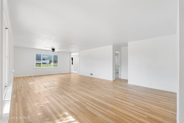 170 10th St, Priest River, ID 83856 - unfurnished living room with light wood finished floors