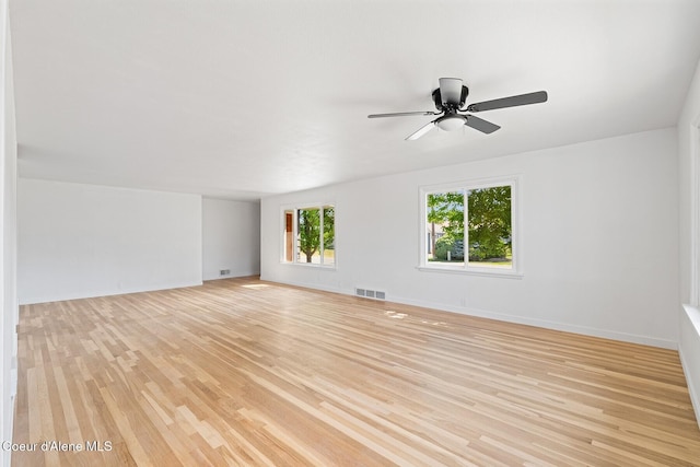 170 10th St, Priest River, ID 83856 - spare room with light wood-style floors and a ceiling fan