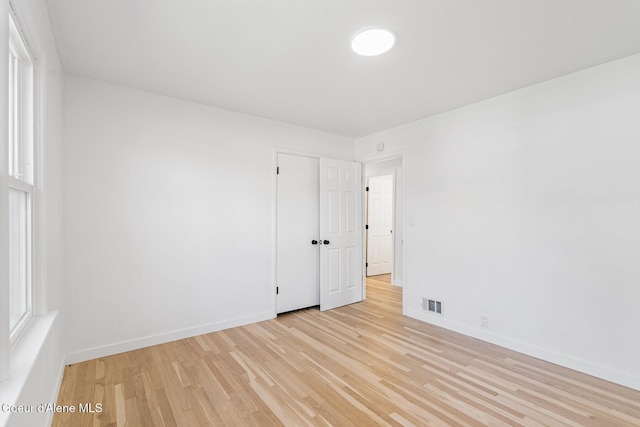 170 10th St, Priest River, ID 83856 - unfurnished room featuring light wood-style flooring and baseboards