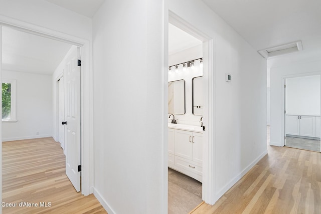 170 10th St, Priest River, ID 83856 - hallway with light wood-style floors and attic access