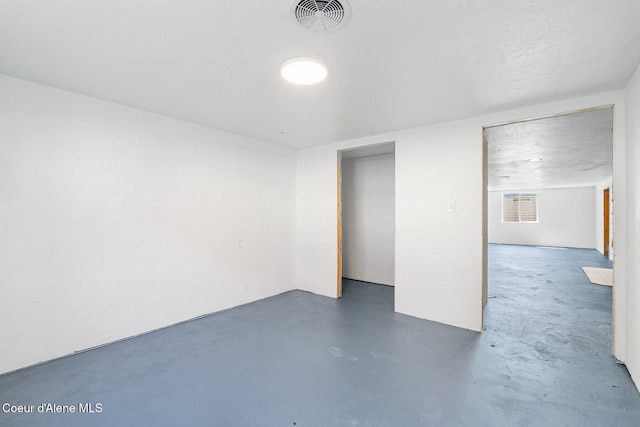 170 10th St, Priest River, ID 83856 - spare room with finished concrete flooring