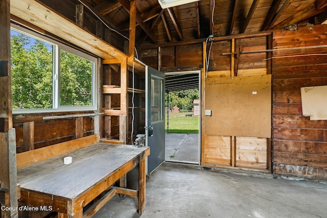 170 10th St, Priest River, ID 83856 - miscellaneous room featuring wooden walls and unfinished concrete flooring