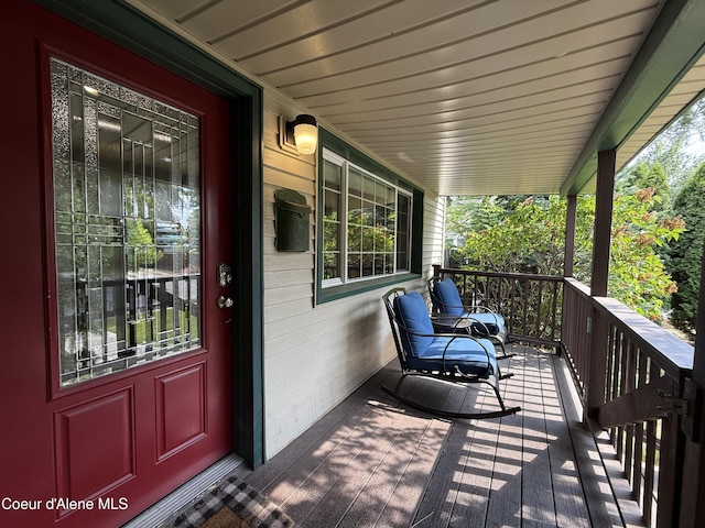 912 N 5th St, Coeur Dalene, ID 83814 - porch featuring a carport