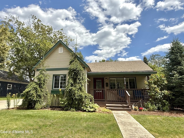 912 N 5th St, Coeur Dalene, ID 83814 - view of front of home featuring a porch and a front yard