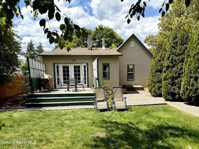 912 N 5th St, Coeur Dalene, ID 83814 - rear view of house with a deck and french doors