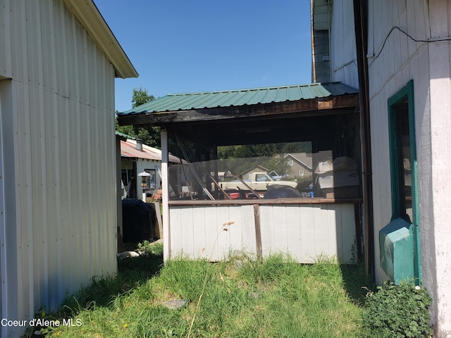 701 N Pine St, Clark Fork, ID 83811 - view of property exterior with a metal roof