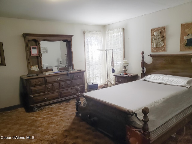 701 N Pine St, Clark Fork, ID 83811 - bedroom with dark carpet