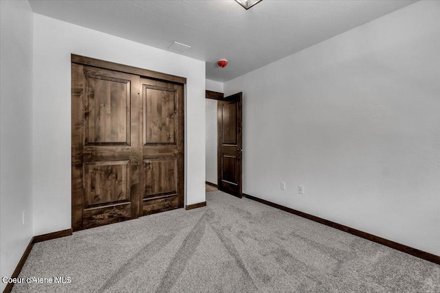 116 Prospector Lp, Kellogg, ID 83837 - unfurnished bedroom featuring carpet floors and baseboards