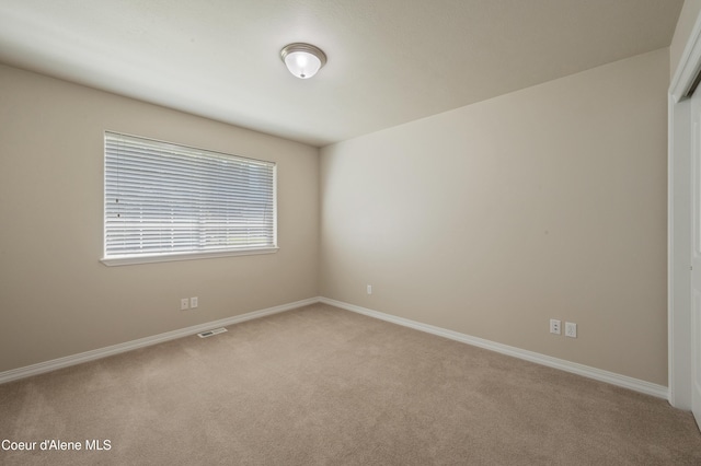 3749 N Miners Loop, Coeur Dalene, ID 83815 - spare room with light carpet and baseboards