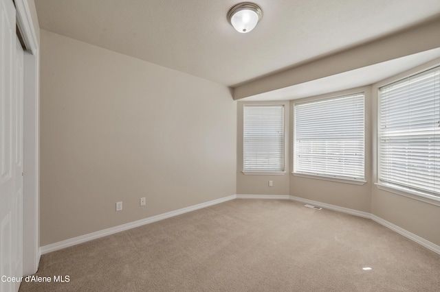 3749 N Miners Loop, Coeur Dalene, ID 83815 - unfurnished room featuring light carpet and baseboards