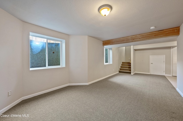 3749 N Miners Loop, Coeur Dalene, ID 83815 - basement with stairway, carpet, and a textured ceiling