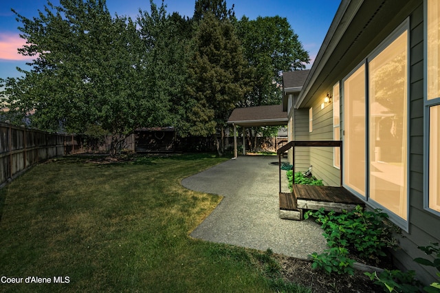 3749 N Miners Loop, Coeur Dalene, ID 83815 - fenced backyard featuring a patio