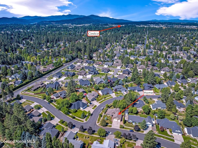 3749 N Miners Loop, Coeur Dalene, ID 83815 - aerial overview of property's location featuring a mountainous background