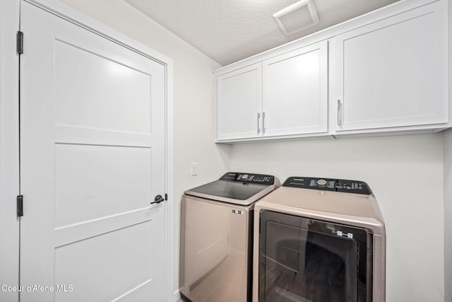 7991 N Girard Cir, Coeur Dalene, ID 83815 - laundry room with independent washer and dryer and cabinet space