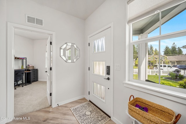 7991 N Girard Cir, Coeur Dalene, ID 83815 - entrance foyer with light wood-type flooring and baseboards