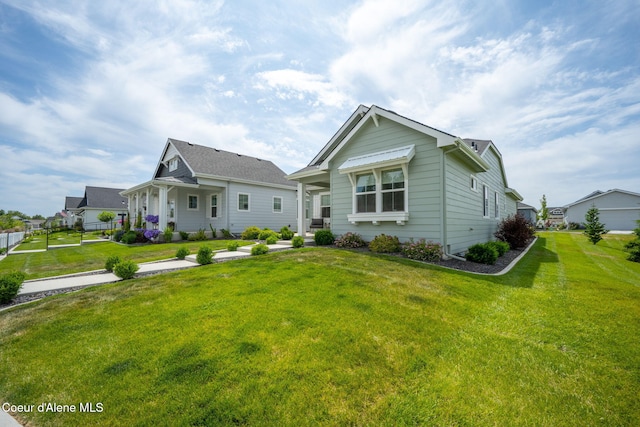 7991 N Girard Cir, Coeur Dalene, ID 83815 - bungalow featuring a front lawn