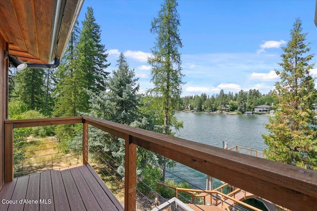 400 S Ohana Beach Dr, Coeur Dalene, ID 83814 - wooden deck with a water view and view of wooded area