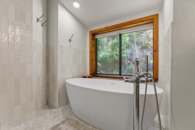 400 S Ohana Beach Dr, Coeur Dalene, ID 83814 - full bath with a freestanding bath and tile walls