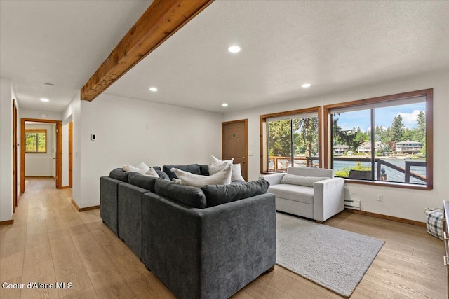400 S Ohana Beach Dr, Coeur Dalene, ID 83814 - living area with recessed lighting, light wood-style flooring, and a baseboard radiator