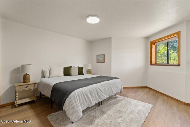 400 S Ohana Beach Dr, Coeur Dalene, ID 83814 - bedroom with hardwood / wood-style floors