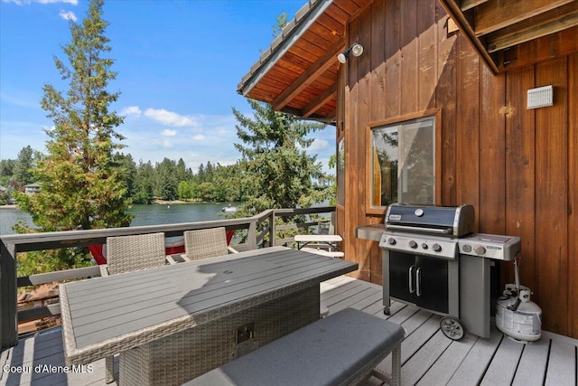 400 S Ohana Beach Dr, Coeur Dalene, ID 83814 - deck featuring a water view and outdoor dining area