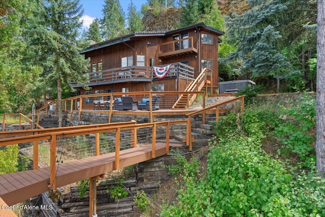 400 S Ohana Beach Dr, Coeur Dalene, ID 83814 - back of house with stairway and a deck