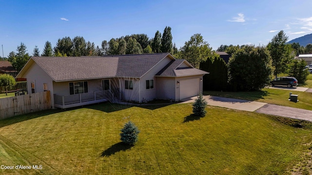 208 Brittany Loop, Sandpoint, ID 83864 - ranch-style home featuring driveway and an attached garage