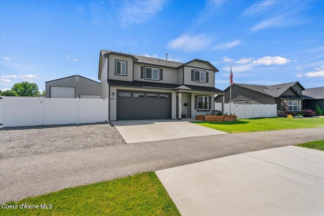 838 W Jenicek Loop, Post Falls, ID 83854 - view of front of house with concrete driveway and a garage