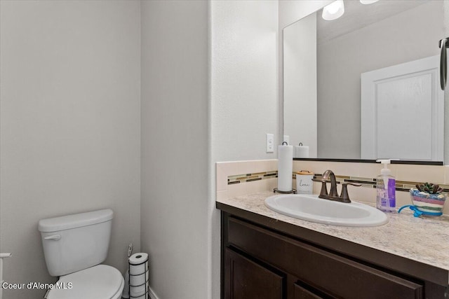 838 W Jenicek Loop, Post Falls, ID 83854 - half bathroom with vanity and tasteful backsplash