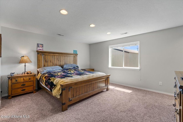 838 W Jenicek Loop, Post Falls, ID 83854 - bedroom featuring carpet flooring, recessed lighting, and a textured ceiling