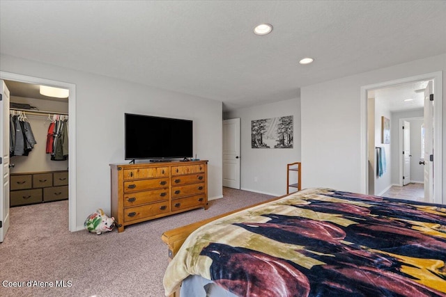 838 W Jenicek Loop, Post Falls, ID 83854 - carpeted bedroom with recessed lighting and a walk in closet