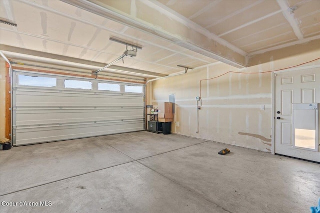 838 W Jenicek Loop, Post Falls, ID 83854 - garage featuring a garage door opener