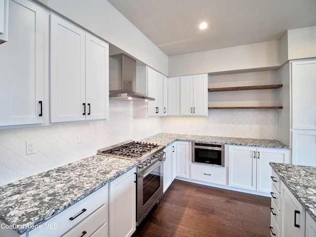 953 E Railroad Ave, Post Falls, ID 83854 - kitchen featuring high end stainless steel range, wall chimney range hood, open shelves, dark wood-style floors, and light stone counters