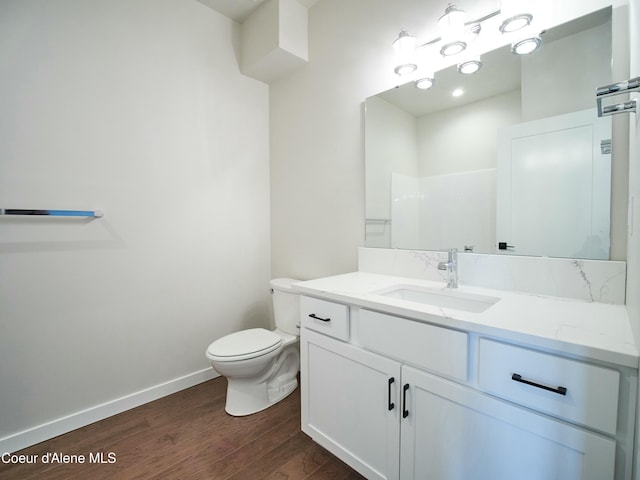 953 E Railroad Ave, Post Falls, ID 83854 - bathroom with wood finished floors and vanity