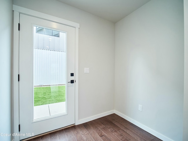 953 E Railroad Ave, Post Falls, ID 83854 - doorway with dark wood-style floors and baseboards