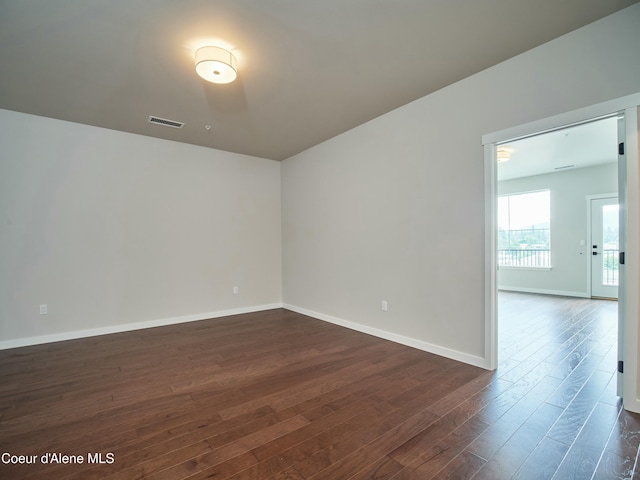 953 E Railroad Ave, Post Falls, ID 83854 - spare room with dark wood-style flooring and baseboards