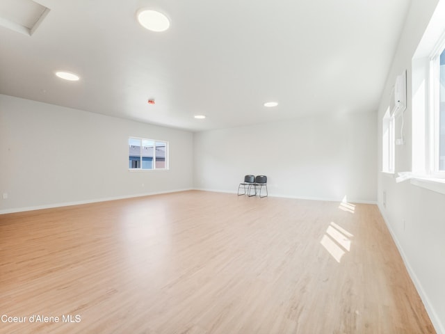953 E Railroad Ave, Post Falls, ID 83854 - unfurnished living room featuring light wood-type flooring and recessed lighting