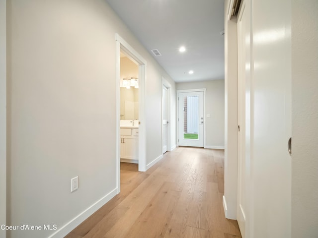 993 E Railroad Ave, Post Falls, ID 83854 - hallway featuring light wood-style flooring and recessed lighting