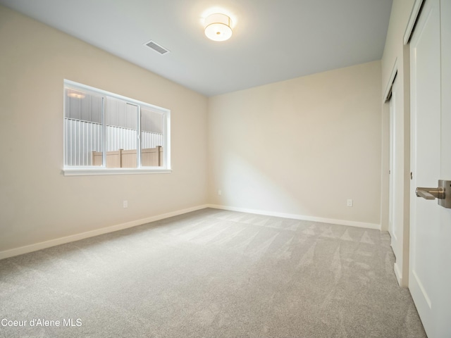 993 E Railroad Ave, Post Falls, ID 83854 - unfurnished bedroom featuring carpet flooring and a closet
